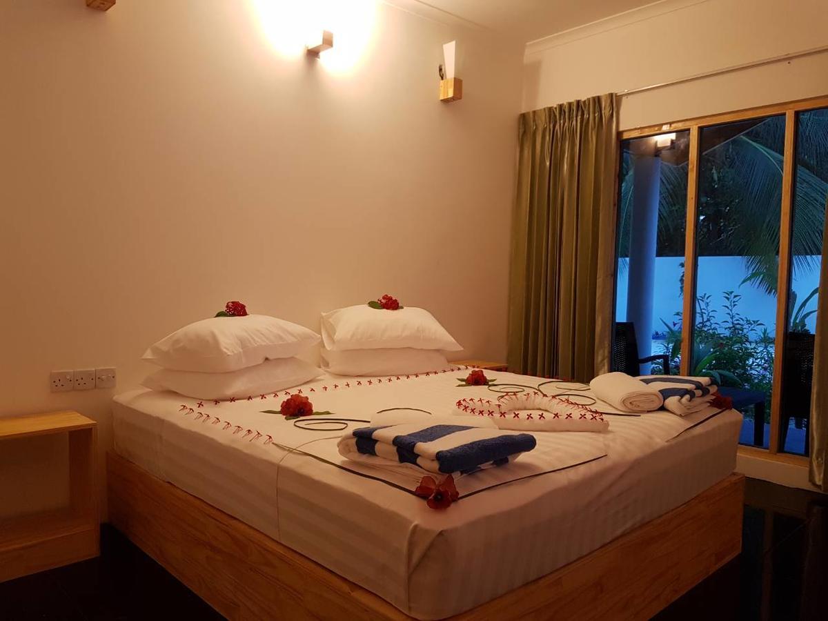Thoddoo Beach Holiday Екстериор снимка